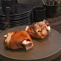 Braised Pork Knuckles With Golden Brown Skin On Wooden Cutting Board