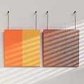 Two Abstract Paintings Hanging on Wall Orange Yellow Split Block Brown Wavy Lines Light Shadow 3d model