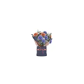Blue Vase With Pink Ribbon Holding Orange Blue White Flowers And Green Leaves