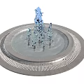 Modern Circular Fountain With Blue Water Jets And Metal Base Grill Detail