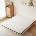 Cozy White Striped Mattress With Green Edge In Bedroom With Wooden Cabinet And Natural Light