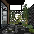 Courtyard Garden Design With Bamboo Plants Stone Pathways Perforated Screen And Circular Window