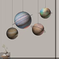 Colorful Planet Shaped Pendant Lights With Rings Hanging In Modern Interior