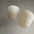 Two Round White Inflatable Lanterns Hanging On Gray Wall For Interior Decor