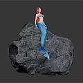 Beautiful Mythical Mermaid With Red Hair And Blue Tail Standing On Gray Rock