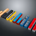 Different Colored Rectangular Building Blocks Arranged In Row On Dark Surface
