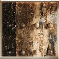 Natural Stone and Wood Decorative Wall Panels with Textured Surfaces and Warm Tones Design