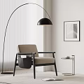 Modern Beige Leisure Chair With Black Armrests Floor Lamp Side Table And Wall Art In Minimalist Space