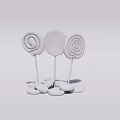 Three Colorful Spiral Lollipops And Striped Candies Displayed On White Background