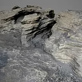 Natural Layered Rock Formation Displaying Textured Geological Structure In Landscape
