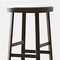 Wooden Bar Stools With Round Leather Seats And Crossed Stretchers In Light Dark Tones