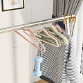 Modern Decorative Ornament Set With Metal Hooks And Colorful Pieces Hanging On Rack