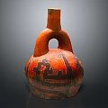 Red Pottery Sculpture With Intricate Carved Black Patterns And Traditional Handle Design