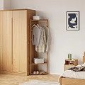 Bedroom Wooden Coat Rack With Hanging Clothes Storage Box Green Bottle Plant And Wall Artwork