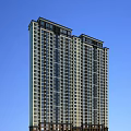 High Rise Residential Building With Modern Exterior And Multiple Windows Under Blue Sky