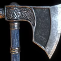Ancient Nordic Axe With Intricate Carvings On Metal Blade And Blue Handle