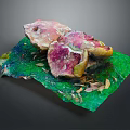 Vibrant Floral Display On Green Leafy Base With Pink Purple Blooms And Yellow Accents
