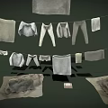Light Gray Apparel Hanging on Ropes Including Pants Towels and Tops