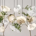 Natural Stone Shaped Chandeliers With Green Plants And Tree Branches In Modern Interior