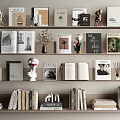 Stylish Books And Magazines On Shelves With Decorative Sculptures Vases And Dried Flowers