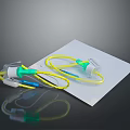 Medical Device With Yellow Green Tubes And Transparent Connectors On White Paper