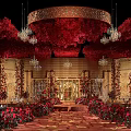 Elegant Banquet Hall Interior With Red Flower Decorations Chandeliers Golden Walls Stage And Carpet