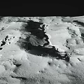 Moon Landscape Displaying Crater Formations Undulating Terrain and Rugged Surface with Natural Shadow Patterns