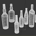 Various Glass Beverage Bottles With Different Shapes Labels And Colors