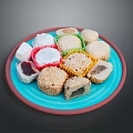 Traditional Assorted Desserts on Blue Plate with Coconut Sesame Coating and Stuffed Fillings