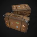 Two Vintage Brown Suitcases With Colorful Travel Stickers And Metal Corners