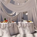 Elegant Event Setup With White Drapes Tables Fruits Wine Bottles Gray Walls And Striped Skylights