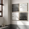 Four Framed Black And White Line Artworks On Wall In Modern Interior Space With Vase