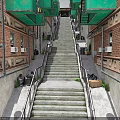 Narrow Alleyway With Red Brick Buildings Green Awnings Street Lamps And Stone Stairs