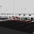 Roadway Toll Facilities With Multiple Toll Booths Electronic Displays And Orange Barriers