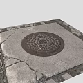 Urban Street Scene With Circular Manhole Cover On Cracked Stone Pavement