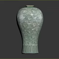 Carved Celadon Vase With Intricate Patterns And Glossy Decorative Ceramic Artwork
