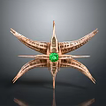 Intricate Star Shaped Jewelry Ornament Featuring Green Gemstone In Metal Frame