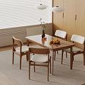 Minimalist Wooden Dining Table and Chairs with Pendant Lights Vase and Fruit in Modern Interior