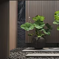 Two Vases With Lotus Leaves And Green Foliage On Stone Steps Against Wooden Slat Wall