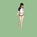 Woman in black white top with pink flower wearing black shorts barefoot on gray background