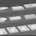 Different Designs of White Washbasins With Faucets on Grey Stone Countertops