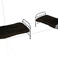Single Bed Featuring Metal Frame Black Mattress and Gray Messy Bedding