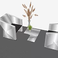 Modern Geometric Table and Chair Set With Small Coffee Table Potted Plant and Pampas Grass