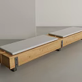 Long Modern Wooden Stools With Gray Padded Seats And Metal Hardware