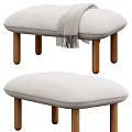 Light Gray Padded Sofa Stools With Wooden Legs And Checkered Fringe Blanket