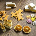 Assorted Desserts With Layer Cake Slices Gingerbread Man Cookies Tarts And Meringues