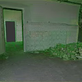 Unfinished Room Interior With Peeling Walls Tile Wall And Construction Debris