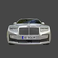 Elegant Silver Luxury Sedan With Sleek Body Design And Large Alloy Wheels