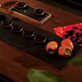 Elegant Tea Set with Red Fu Character Golden Patterns Persimmons on Dark Mat Wooden Tabletop