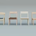 Wooden Dining Chairs Display With Four Different Colored Upholstered Seats 3d model